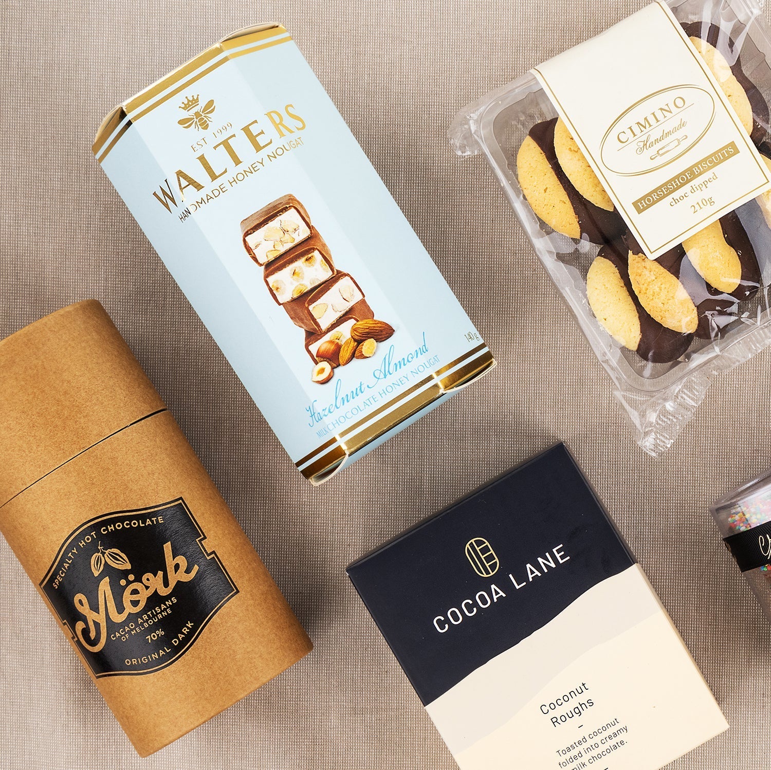 Chocolate Delight Hamper featuring Walter's hazelnut chocolates, Cocoa Lane cocoa mix, milk chocolate mochi in a kraft tube, .